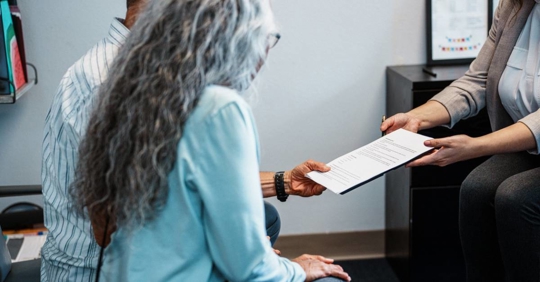 Couple receiving news about inheritance